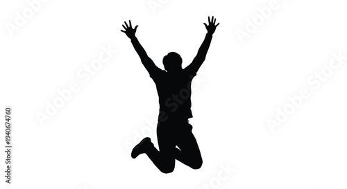 Silhouette of a person jumping with arms raised in celebration