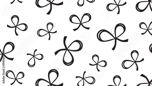 Bow tie pattern with hand-drawn black outlines on a white background, suggesting festive or decorative design elements.