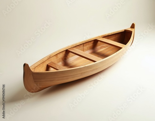 Empty wooden rowboat studio shot isolated on light background. Classic canoe with wood interior detail. Small vessel ready for water adventure.