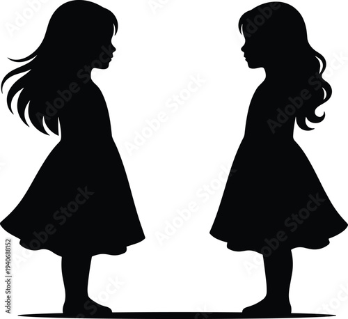 Black silhouette of two little girls in dresses with long hair standing and facing each other isolated on white background for childhood friendship concepts