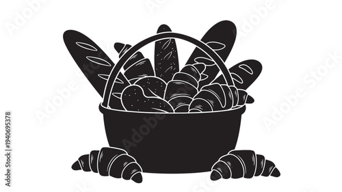 Assorted pastries and bread in a basket with croissants on the floor around it viewed from the front