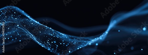 Abstract flowing blue particle wave on dark background representing data, energy, and digital connections.