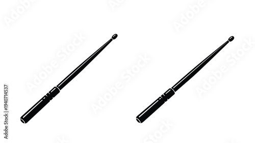 Two black drumsticks depicted in a stark minimalist silhouette