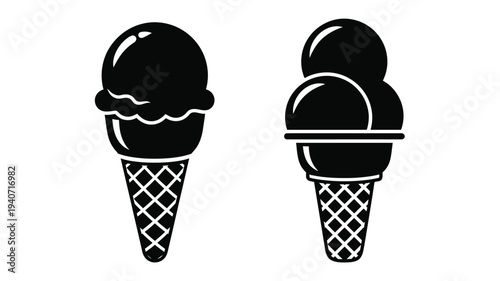 Two black ice cream cones presented in a striking silhouette