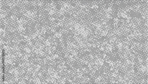 Dense pattern of small dots creating a textured background abstract gray and white overlay