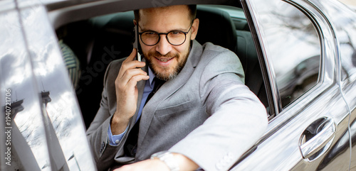 Businessman talking on phon...