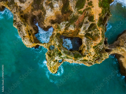 Natural Sea Arch and Ocean Waves Along Dramatic Coast