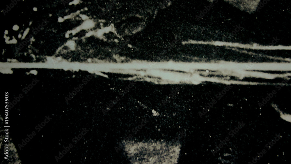 Obraz premium Abstract grunge texture with white scratches on dark background