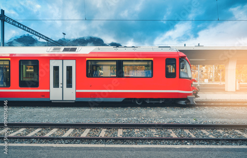 Red modern passenger train ...