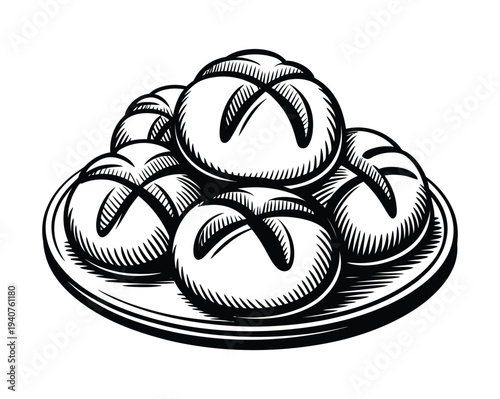 A plate of freshly baked bread rolls on a white background