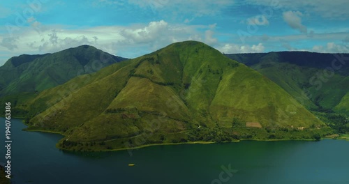 Scenic aerial drone landscape of Lake Toba tropical volcanic lake
