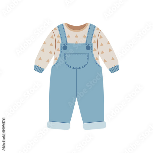 Cute baby outfit with blue denim overalls and patterned sweater