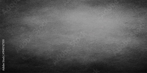 Old dark grunge metal texture with a rough gray concrete surface and aged vintage paper pattern on a dirty black stone wall backdrop