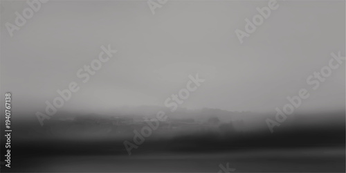 A cinematic time lapse of dark storm clouds and mist creates an abstract gray texture where light fades into a moody fog and rain backdrop