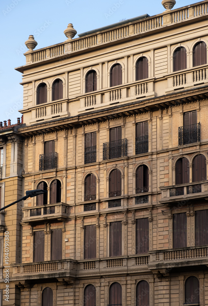 Obraz premium Historic European building facade with classical architecture and balconies