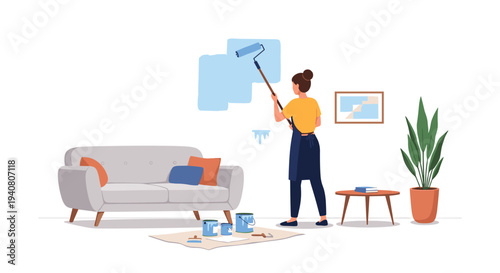 A woman with a bun is actively painting a light blue section on a pristine white wall in a cozy living room setting.
