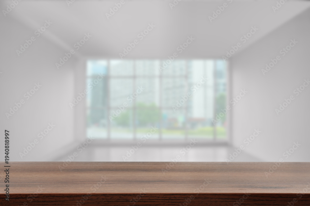 Fototapeta premium Empty wooden table in room, selective focus. Space for design