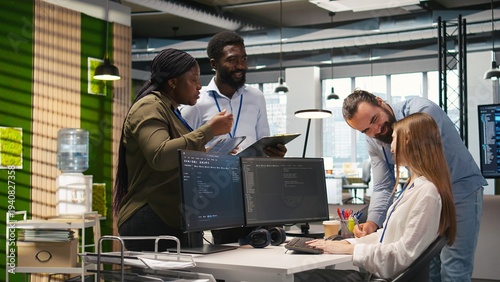 Canvas Print Friendly coworkers helping junior dev code AI algorithms to debug software issues and improve systems, teamwork concept
