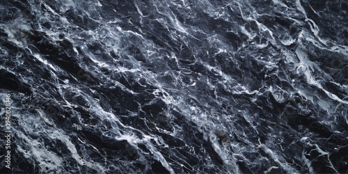 Abstract of dark textured marble, a captivating display of natural beauty with intricate patterns, swirling veins, and a sense of depth and luxury.