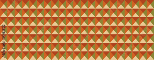 Geometric autumnal triangle pattern.  Earthy tones create a sophisticated, retro design ideal for fallthemed projects, website backgrounds, or textile prints.