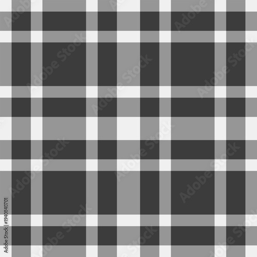 Elegant plaid fabric design suggests familiarity and order. The refined textile background strengthens fashion communication visuals.