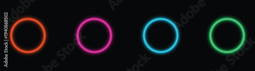 Colorful electric light circles in vivid orange pink blue and green hues against a solid black backdrop