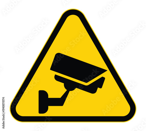 Photos Warning Sign with Surveillance Camera Icon in Bright Yellow Triangle Shape