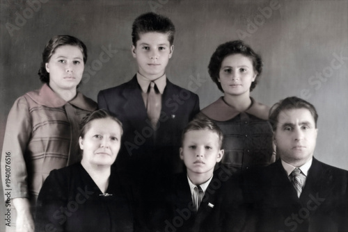 USSR, Leningrad - September 15, 1946: Vintage family portrait. Mother, father, and children. Retro photograph from 1946.