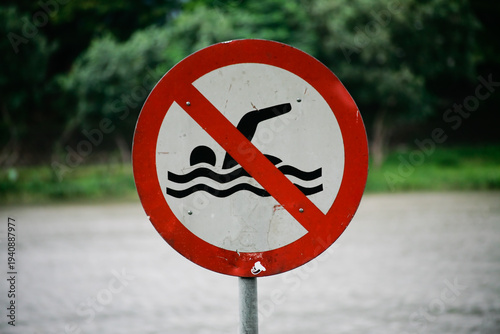 close up of no swimming sign on the river