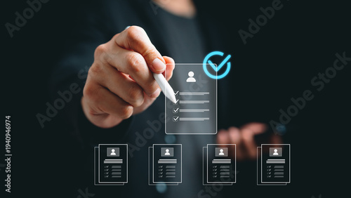Hand use stylus select digital profile checklist interface with verification checkmark, representing recruitment screen, candidate evaluation, human resource selection and hiring process management.