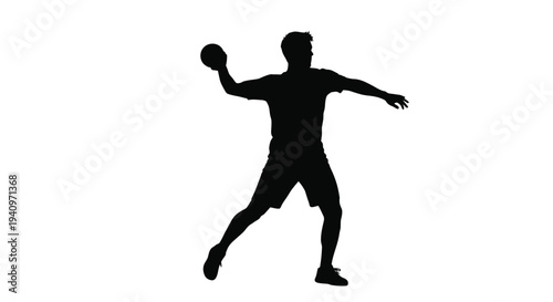Silhouette of a handball player preparing to throw the ball in action