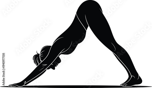 Silhouette of a woman in downward facing dog yoga pose for meditation and exercise