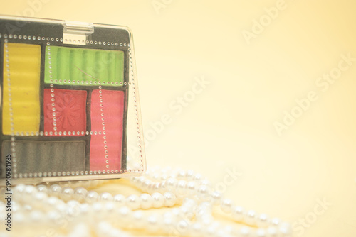 Colorful eyeshadow palette with makeup brush beauty concept