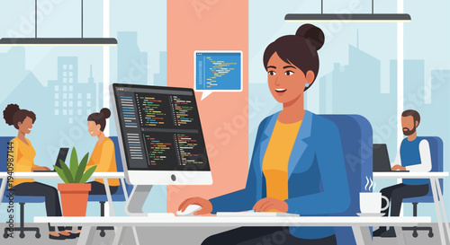 A smiling woman programmer codes on her computer in a bright office.
