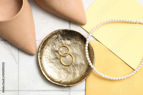 Golden plate of wedding rin...