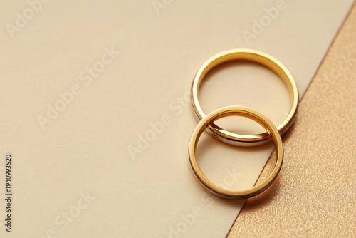 Wedding rings on color back...