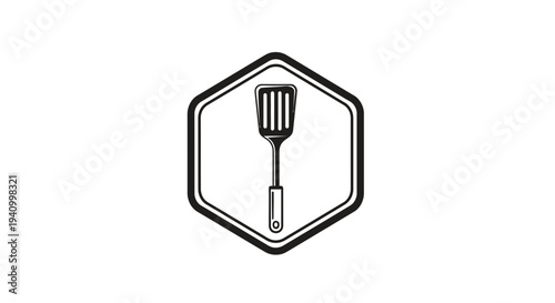 Black and white illustration of a spatula.