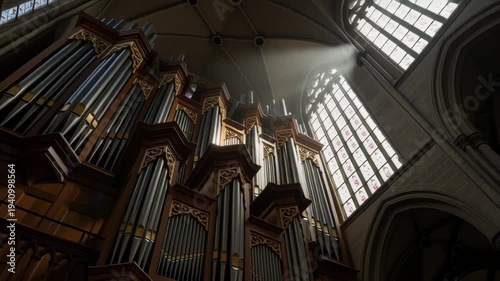 Historic Pipe Organ in Church Interior.