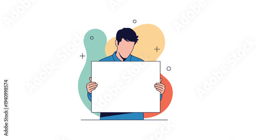 Young man standing and holding a large blank white board for advertising or important message presentation purposes.