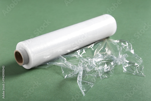 Roll of stretch wrap on gre...