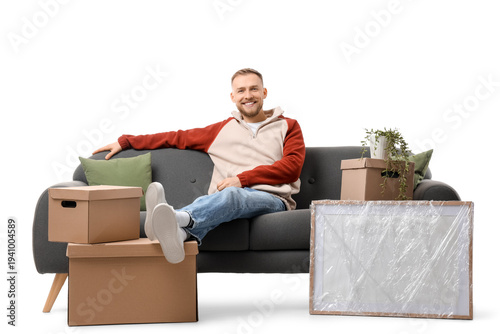 Handsome man sitting on sof...