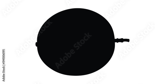 A silhouetted image of a mature durian fruit with stem visible