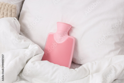 Pink hot water bottle with ...