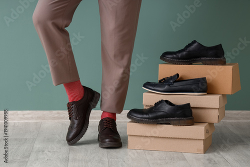 Male legs with stylish shoe...