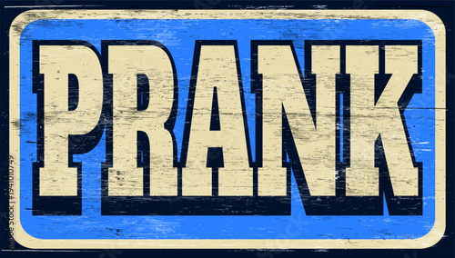 Aged retro prank sign on wood