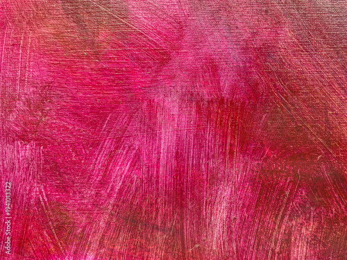 brushstrokes of red paint on artistic canvas with visible brush texture. painted background.