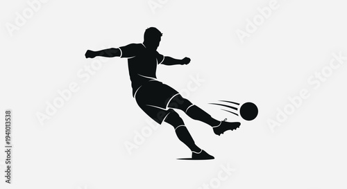 Dynamic soccer player kicking ball in motion