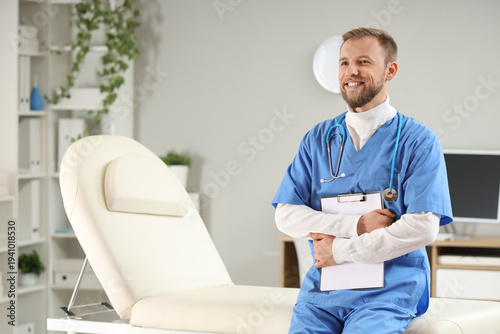 Male doctor with stethoscop...