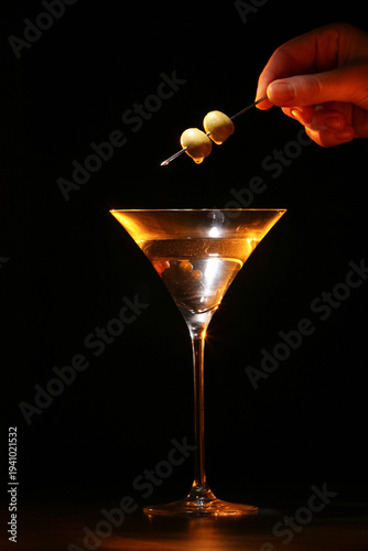 Female hand with olives and...