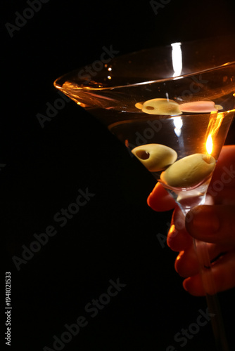 Female hand with glass of m...